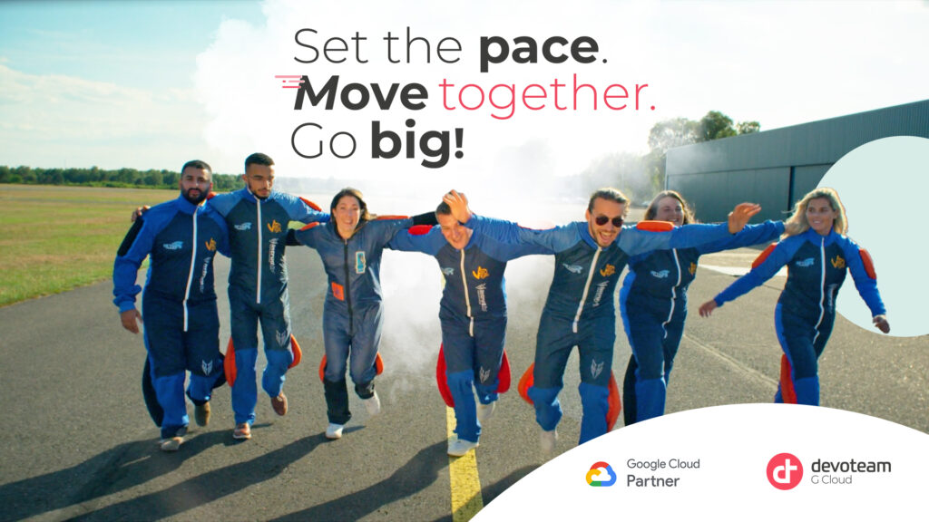 Google Cloud Team: a group of people in matching parachute suits running