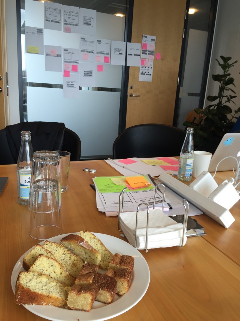 The workshop table covered in post-its and drawing materials.